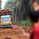 Trucks carry palm oil fruit out of a plantation in Ogan Komering Ilir, South Sumatra province, Indonesia, January 11, 2017.
